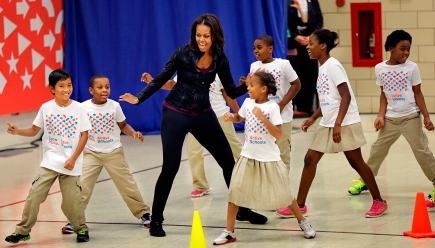 michelle-obama-exercises-with-schoolchildren-at-orr-elementary-school-as-part-of-a-lets-move-active-schools-event-in-washington-dc